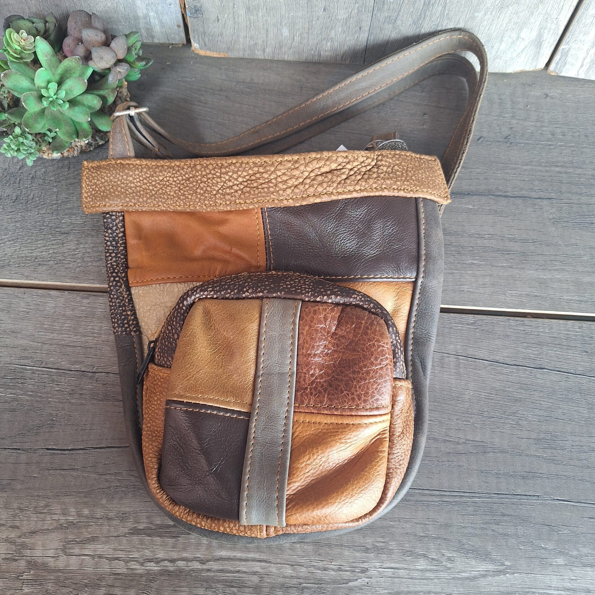 20260602_143930.jpg Traingle Shape Genuine Leather sling Bag - Image 1
